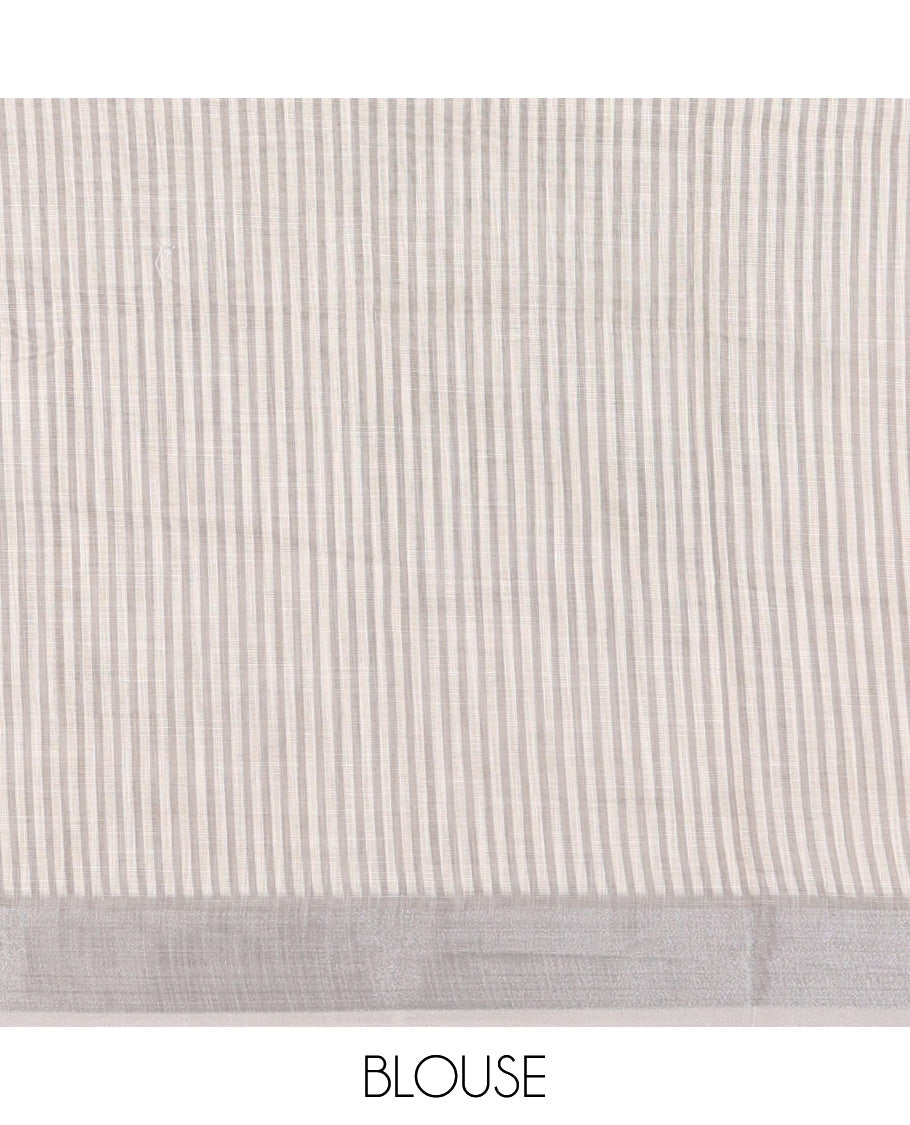 Cream hand painting style deer motifs printed linen cotton saree, silver bavanji border, and vertical stripes printed blouse