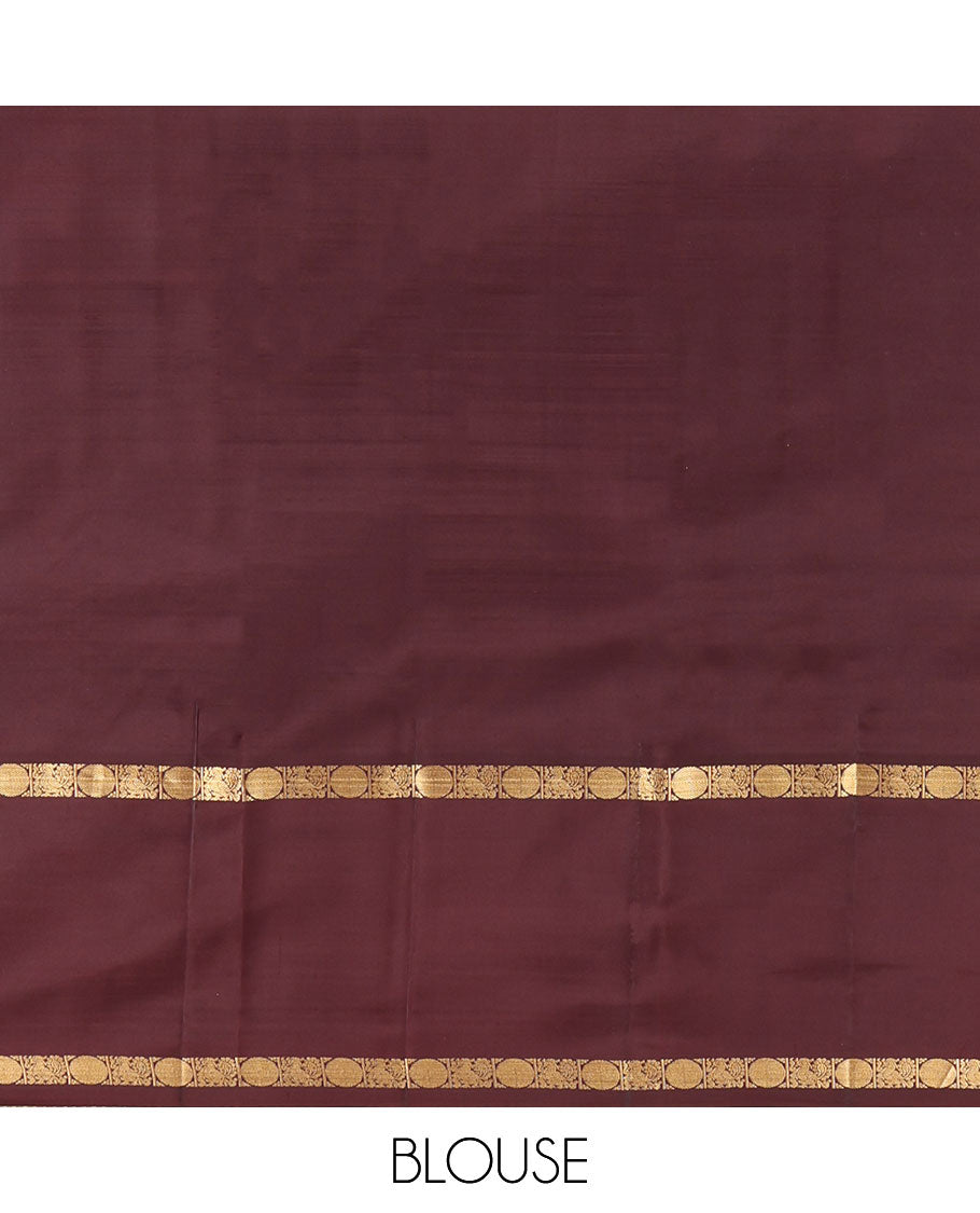 Pink Kanchipuram Silk Saree, Subtly Enriched with Zari Stripes All Over Its Body, Complemented by Contrast Rettai Pettu Border of Mayil and Rudraksham Designs, Gleaming Zari-Striped Pallu, and Paired with a Contrast Blouse