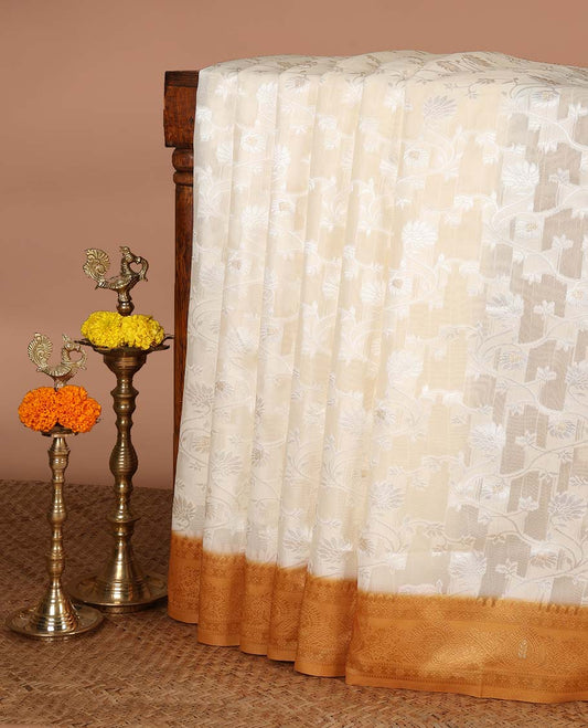 Cream with gold thread weaving, zari butta banaras brasso saree with contrast thread border & thread weaving pallu along with butta design blouse