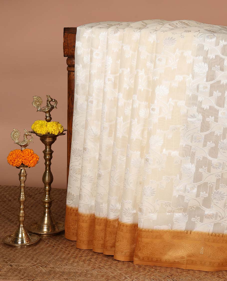 Cream with gold thread weaving, zari butta banaras brasso saree with contrast thread border & thread weaving pallu along with butta design blouse