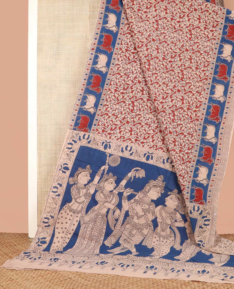 Red Machine-Printed Kalamkari Cotton Saree Features Floral Vine Print on Its Body, Complemented by Contrast Pichwai Cow Printed Border, Pallu Depicts Lord Radha Krishnan Motifs, and Paired with a Printed Blouse