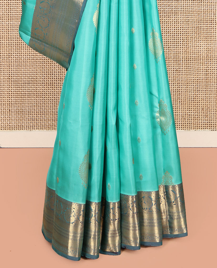 Turquoise Vasundhara Lite Silk Mix Saree, Detailed with Zari Buttas, Complemented by a Contrast Border of Kodi Mayil, Muthu, Mayil Kann, and Kodi Visiry, Jaal Pallu, and a Contrast Blouse