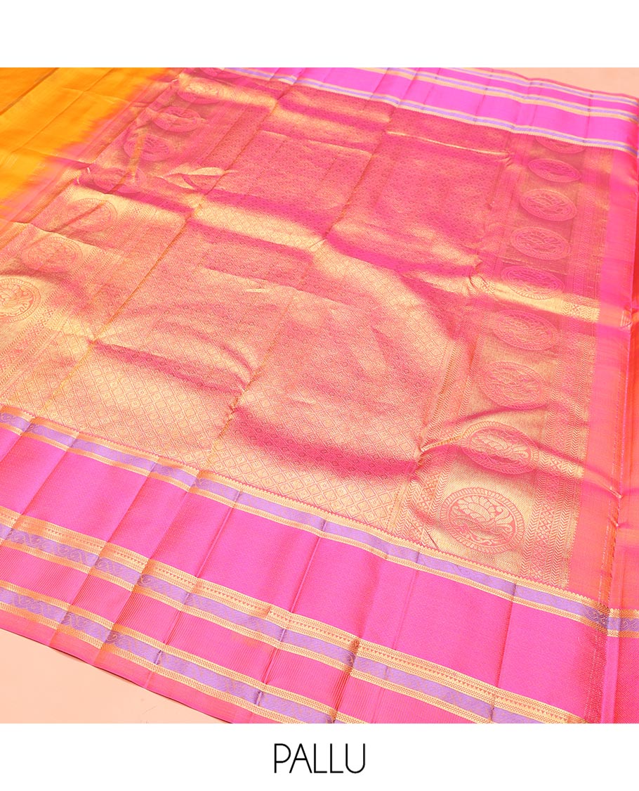 Yellow Vasundhara Silk Saree, Sparsely Woven with Stripes and Chakram Buttas on Its Body, Complemented by a Contrast Border of Rekku, Bentex, and Kodi Visiry Designs, Grand Jaal Design Pallu, and Paired with a Contrast Blouse