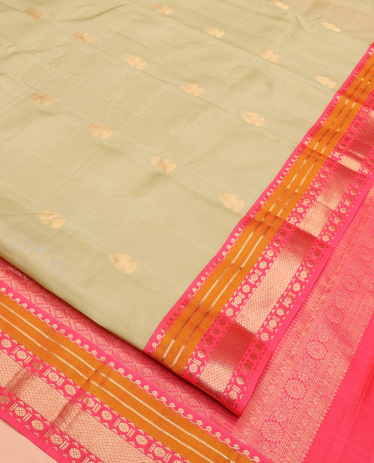 Green Vasundhara Lite Silk Mix Saree, Sparsely Woven with Iruthalai Pakshi Buttas All Over Its Body, Complemented by Contrast Border of Salngai, Banaras, Kamalam, and Mayil Kann Designs, Grand Jaal Pallu and Paired with a Contrast Blouse