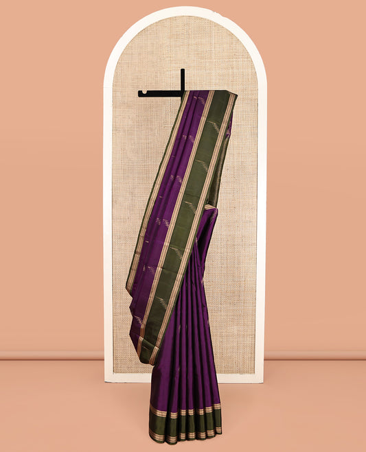 Purple Mayuri Soft Silk Saree, Gleamed Up with Buttas, Contrast Zari Border, Pallu of Intricate Design, and a Contrast Blouse