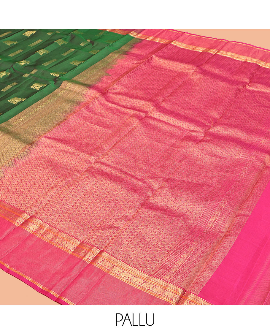Green Vasundhara Lite Silk Mix Saree, Adorned with Pichwai Cow Buttas, Complemented by a Contrast Border of Rekku, Neli, and Yaanai Designs, Intricate Pallu, and a Contrast Blouse