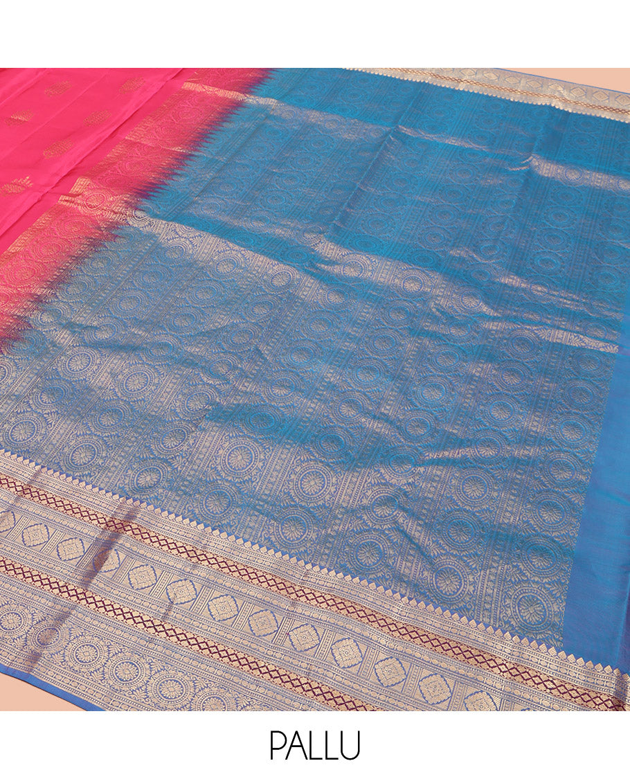 Pink Vasundhara Lite Silk Mix Saree, Beautified with Deepam Buttas, Complemented by a Contrast Border of Thilakam Mokku, Poun, Muthu, Diamond and Chakram Designs, Pallu Steeped with Chakram Designs, and Paired with a Contrast Blouse