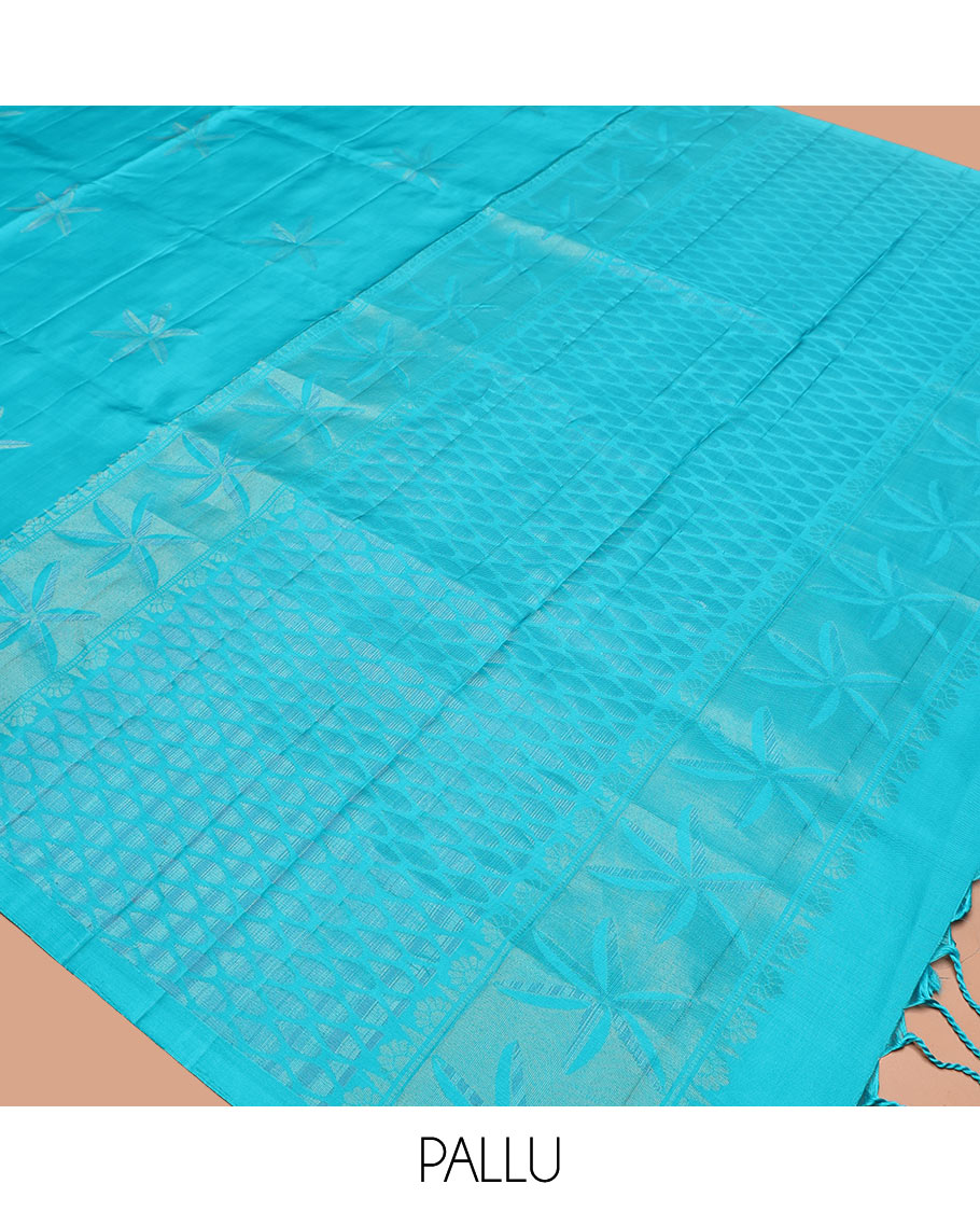 Borderless Blue Mayuri Soft Silk Saree, Sparsely Woven with Floral Buttas All Over Its Body, Sparsely Sparkled Pallu, and Paired with a Matching Blouse