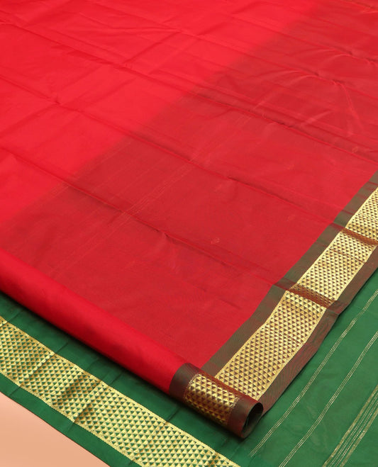 Red Kanchipuram Silk Saree, Woven with Zari Buttas, a Contrast Ara Maadam Border, Zari Design Pallu, and a Contrast Blouse