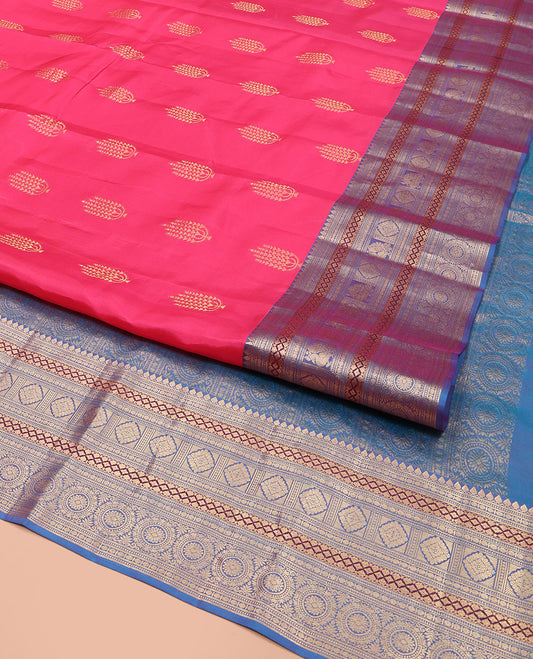 Pink Vasundhara Lite Silk Mix Saree, Beautified with Deepam Buttas, Complemented by a Contrast Border of Thilakam Mokku, Poun, Muthu, Diamond and Chakram Designs, Pallu Steeped with Chakram Designs, and Paired with a Contrast Blouse