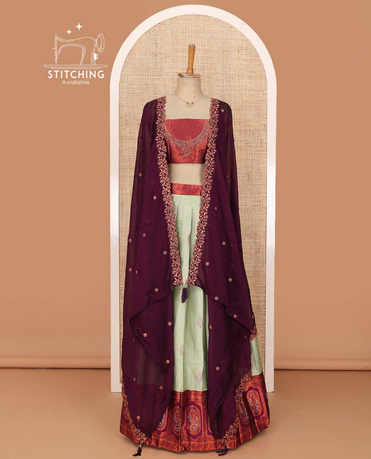 Green lehenga set, zari design with contrast Mughal design border skirt, jacquard stone work blouse, and scallop embroidered dhavani