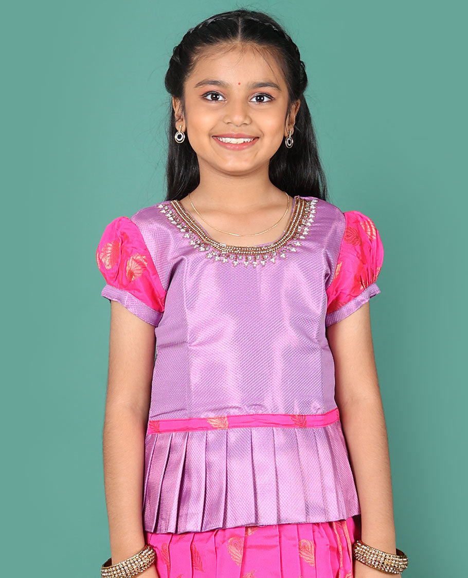 Pink readymade art silk pavadai, peacock feather buttas & contrast geometric border skirt, & embroidery round neck puff-sleeve blouse