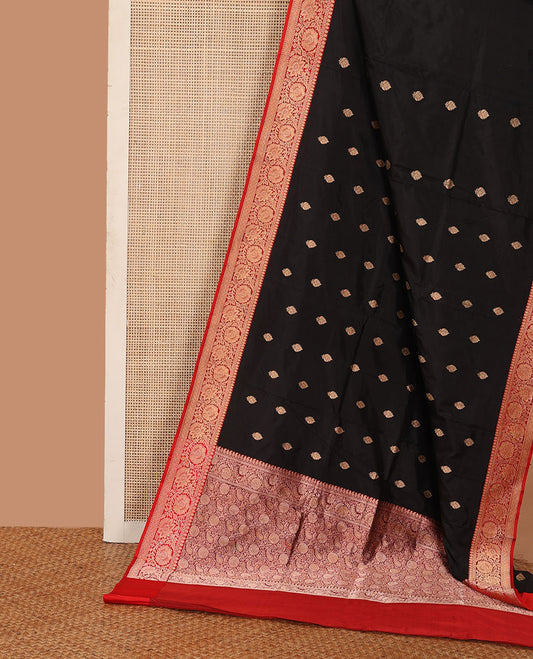 Black zari buttas katan silk saree, contrast floral creeper zari border, and floral and paisley jaal pallu