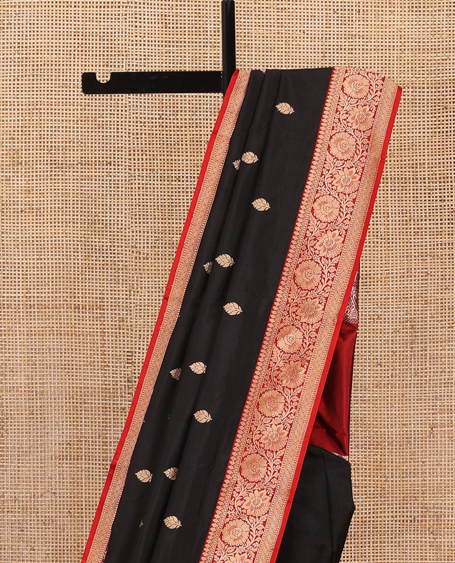 Black zari buttas katan silk saree, contrast floral creeper zari border, and floral and paisley jaal pallu