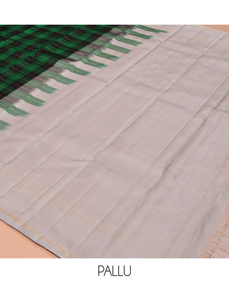 Green Checked Kanchipuram Silk Saree, Complemented by a Contrast Border of Zari Stripes, Zari Checked Pallu, and a Contrast Blouse