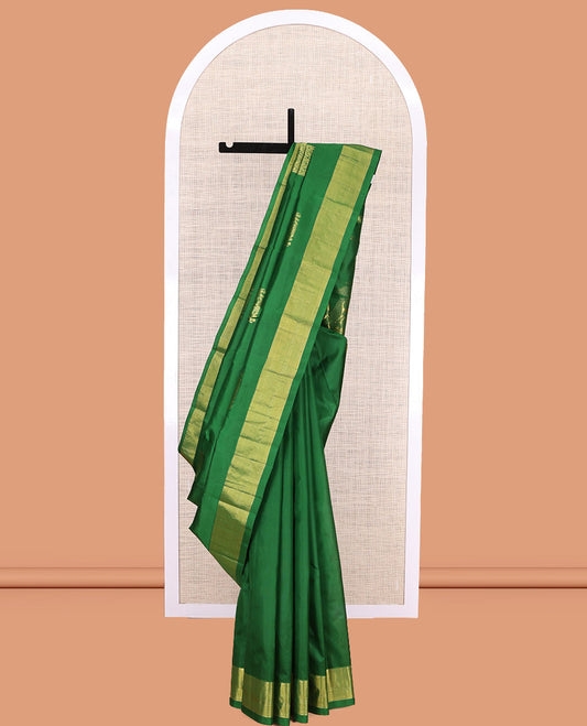 Green Kanchipuram Silk Saree, Woven with Yaanai Buttas, Highlighted by Zari Border, Pallu of Yaanai Design, and a Matching Blouse