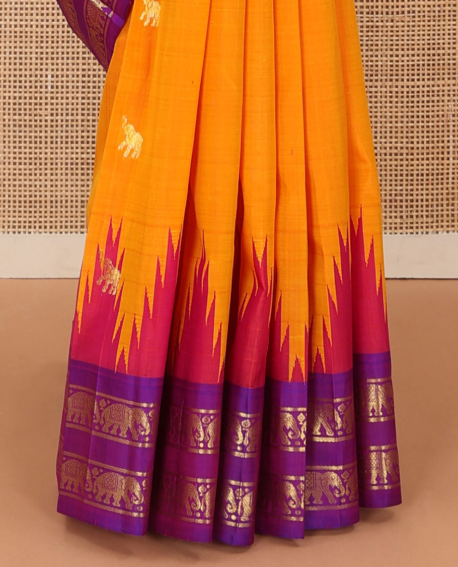 Orange yaanai zari buttas Kanchipuram silk saree, contrast one-sided thazampoo rekku rettai pettu border of yaanai motifs, and human motifs pallu