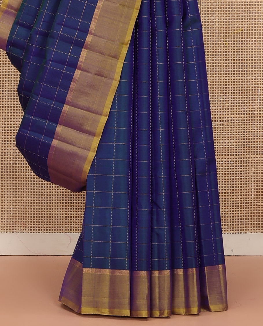 Blue Kanchipuram Silk Saree Delicately Woven with Checks, Complemented by a Contrast Border, Sparsely Zari Woven  Pallu, and Paired with a Contrast Blouse