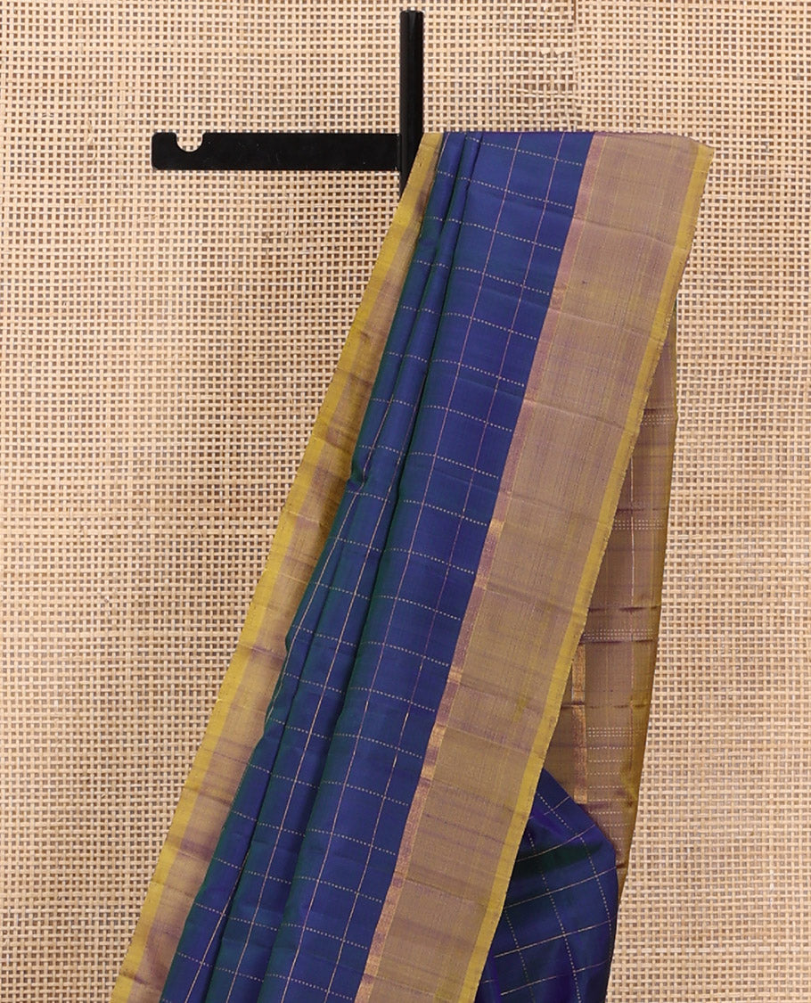 Blue Kanchipuram Silk Saree Delicately Woven with Checks, Complemented by a Contrast Border, Sparsely Zari Woven  Pallu, and Paired with a Contrast Blouse