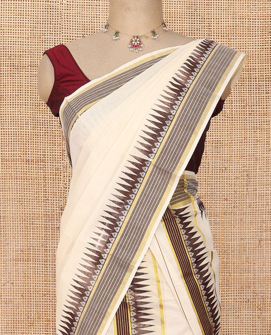 Cream plain Kerala mundu set with contrast temple striped border