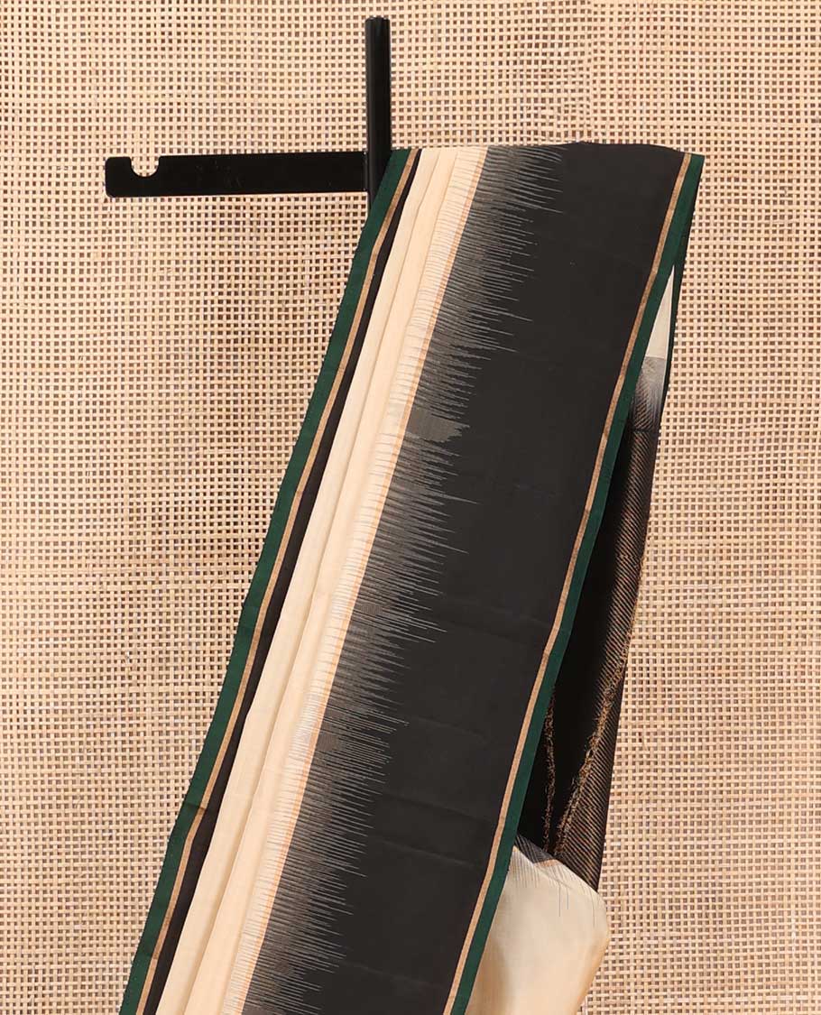 Cream soft silk saree, contrast zari border, and zari-rich pallu of temple and kodi rudraksham designs