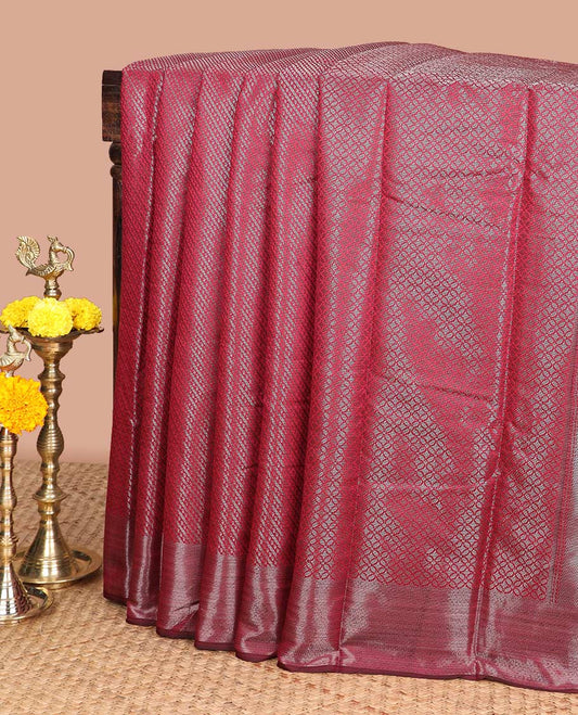 Maroon antique zari striped desig soft silk saree with self border & self pallu along with silver zari blouse
