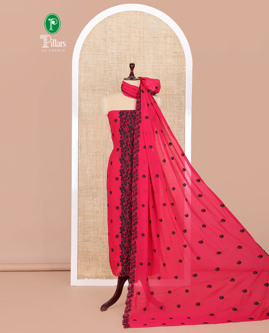 Rani Pink-Black Georgette Material Churidar Features Floral-Paisley Embroidery Top, a American Crepe Bottom, a Scallop Embroidered Dupatta