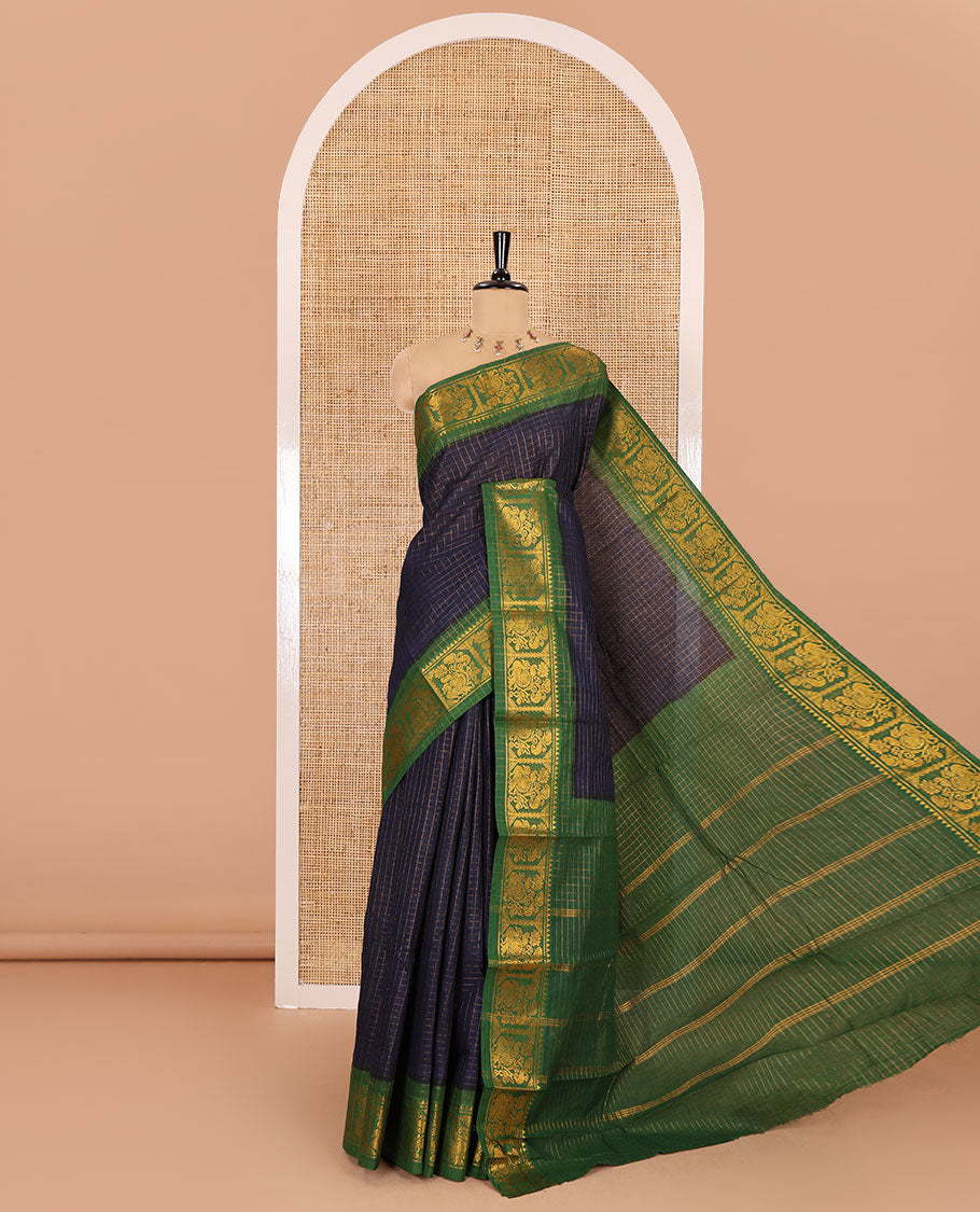 Navy blue checked sungudi cotton saree, contrast zari border of peacock motifs, zari striped pallu, and a contrast zari design blouse