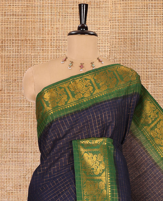 Navy blue checked sungudi cotton saree, contrast zari border of peacock motifs, zari striped pallu, and a contrast zari design blouse