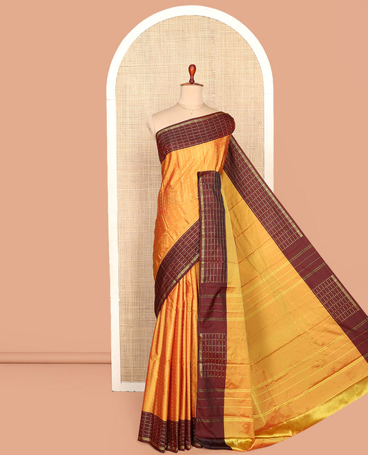 Yellow Aarani Silk Saree, Lightly Embellished with Zari Buttas All Over Its Body, Complemented by a Contrast Zari Design Border, Pallu of Stripes, and Paired with a Matching Blouse