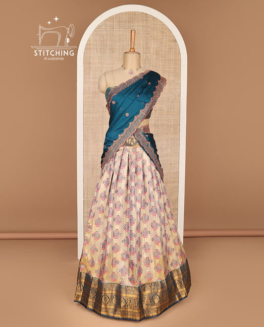 Cream floral buttas banaras half saree with contrast zari design border , zari design blouse & floral zari design dhavani