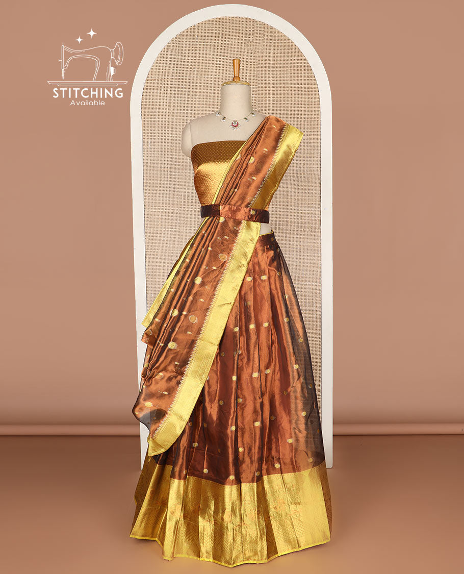 Dark brown  buttas tissue half saree with contrast zari design border, checked zari design blouse & floral design dhavani