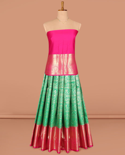 Green Art Silk Pavadai Material Set, Elevated with Jacquard Design on Its Skirt, Complemented by a Contrast Traditional Zari Design Woven Border, and Paired with a Contrast Blouse
