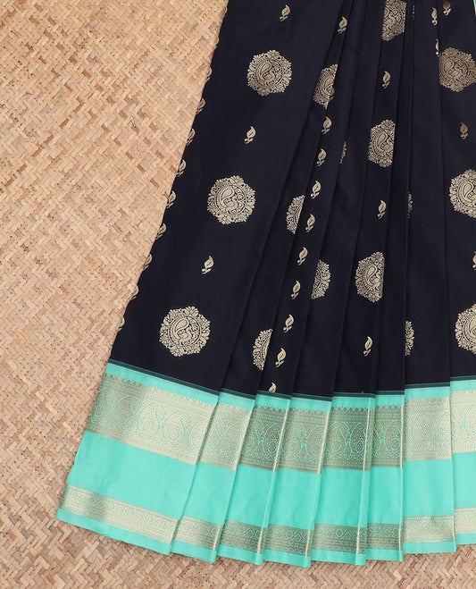 Black zari buttas gift saree, contrast traditional zari design rettai pettu border, and zari-rich jaal pallu