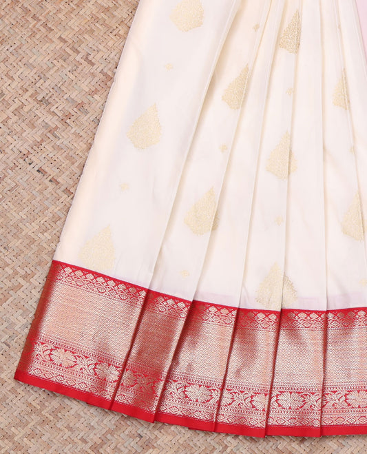 Cream Budget Silk Saree, Enthralled with Zari Buttas All Over Its Body, Complemented by a Contrast Traditional Zari Design Border, Pallu Features Intricate Designs, and Paired with a Contrast Blouse