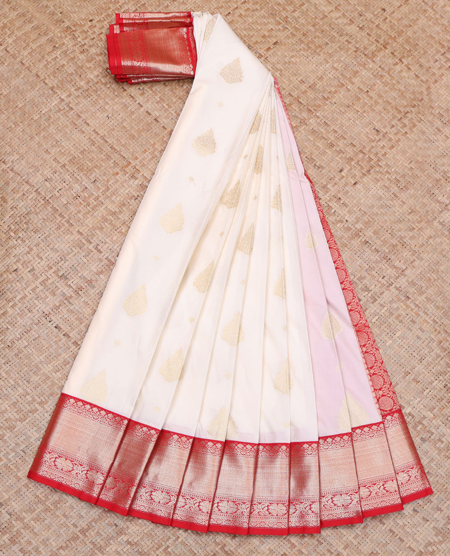 Cream Budget Silk Saree, Enthralled with Zari Buttas All Over Its Body, Complemented by a Contrast Traditional Zari Design Border, Pallu Features Intricate Designs, and Paired with a Contrast Blouse