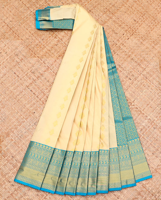 Cream Budget Silk Saree, Mesmerized with Zari Buttas on Its Body, Complemented by a Contrast Traditional Zari Design Border, Pallu of Ogee Patterns, and Paired with a Contrast Blouse