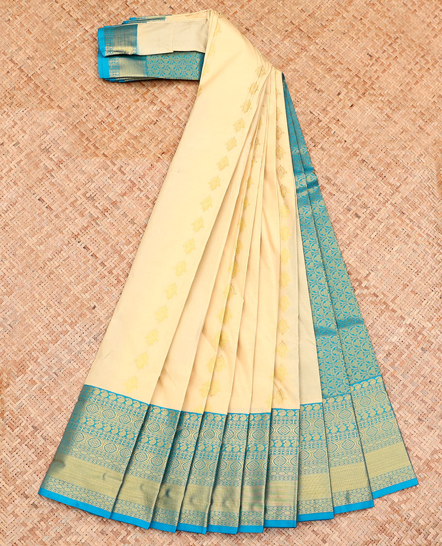 Cream Budget Silk Saree, Mesmerized with Zari Buttas on Its Body, Complemented by a Contrast Traditional Zari Design Border, Pallu of Ogee Patterns, and Paired with a Contrast Blouse