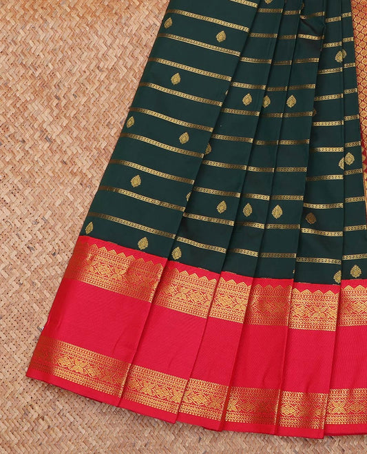 Green Budget Silk Saree, Enriched with Zari Buttas and Stripes All Over Its Body, Complemented by Contrast Traditional Zari Designs Woven Rettai Pettu Border, Grand Jaal Pallu, and Paired with a Contrast Blouse