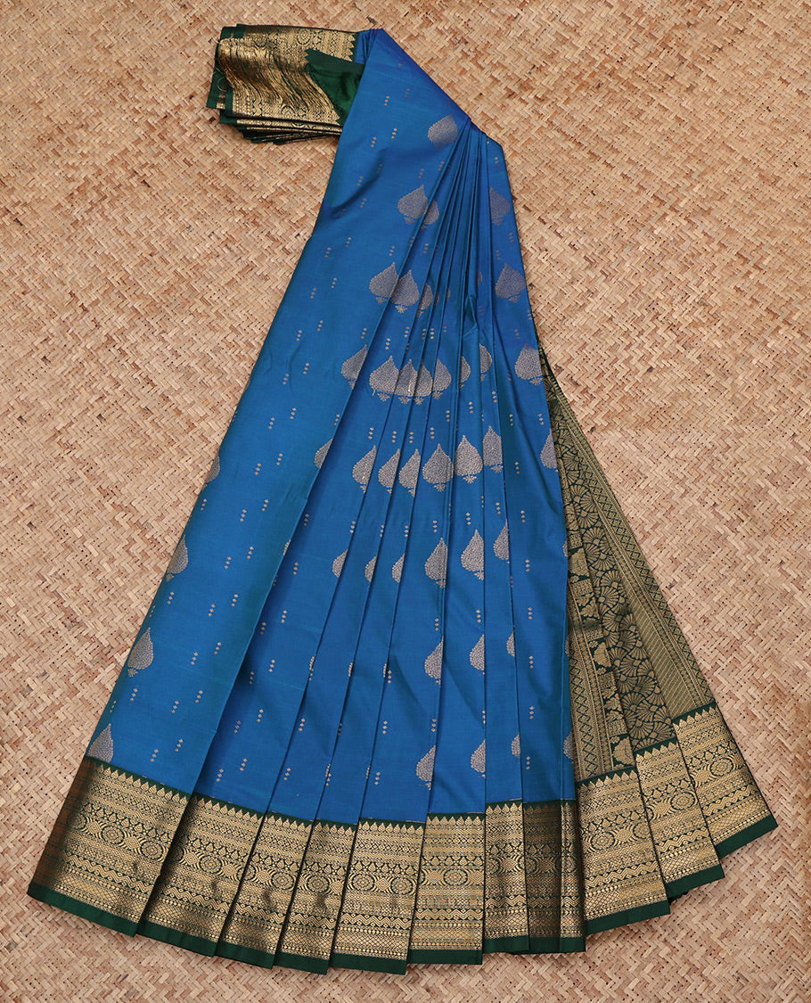 Blue Budget Silk Saree, Mesmerized with Zari Buttas All Over Its Body, Complemented by a Contrast Traditional Zari Border, Grand Pallu, and Paired with a Contrast Blouse