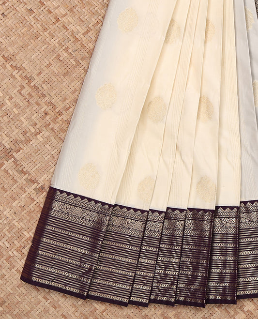 Cream Budget Silk Saree, Subtly Sparkled with Zari Buttas, Complemented by a Contrast Traditional Zari Border, Jaal Pallu, and a Contrast Blouse