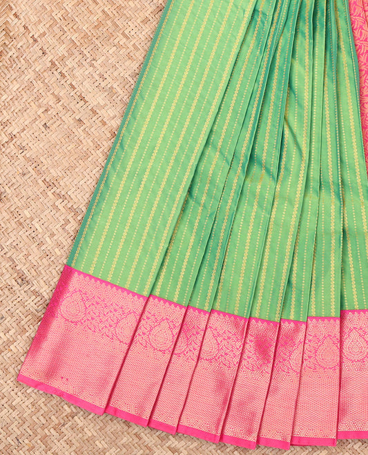 Green Budget Silk Saree, Accentuated with Zari Stripes, Complemented by a Contrast Traditional Zari Border, Grand Pallu, and a Contrast Blouse