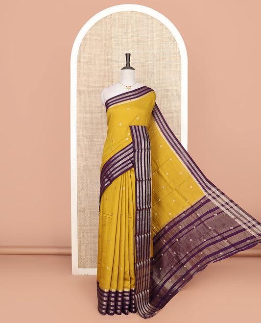 Yellow zari buttas woven Assam silk saree, contrast big border of traditional zari designs, and pallu of zari buttas and zari stripes