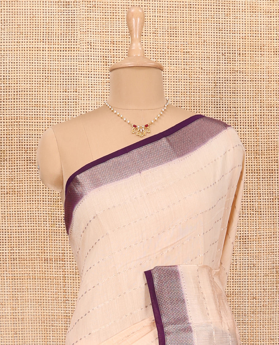 Sandal Assam Silk Saree Spotlighted with All-Over Buttas, Complemented by Contrast Traditional Zari Design Border, Pallu Elevated with Zari, and Paired with a Contrast Blouse