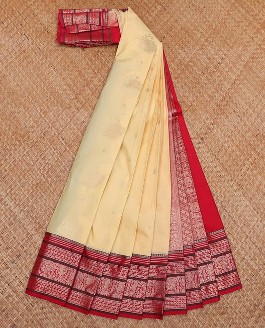 Yellow Budget Silk Saree, Sparsely Sparked with Zari Buttas On Its Body, Complemented by Contrast Traditional Zari Designs Woven Border, Grand Pallu and Paired with a Contrast Blouse
