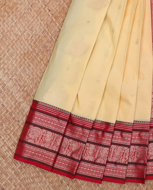 Yellow Budget Silk Saree, Sparsely Sparked with Zari Buttas On Its Body, Complemented by Contrast Traditional Zari Designs Woven Border, Grand Pallu and Paired with a Contrast Blouse