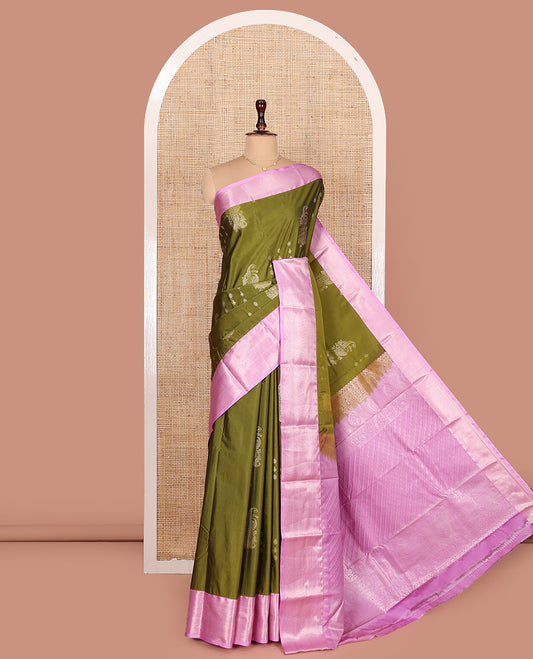 Green Budget Silk Saree, Accentuated with Floral-Paisley Zari Buttas All Over Its Body, Complemented by a Contrast Border of Traditional Designs Woven in Zari, Intricately Designed Pallu, and Paired with a Contrast Blouse