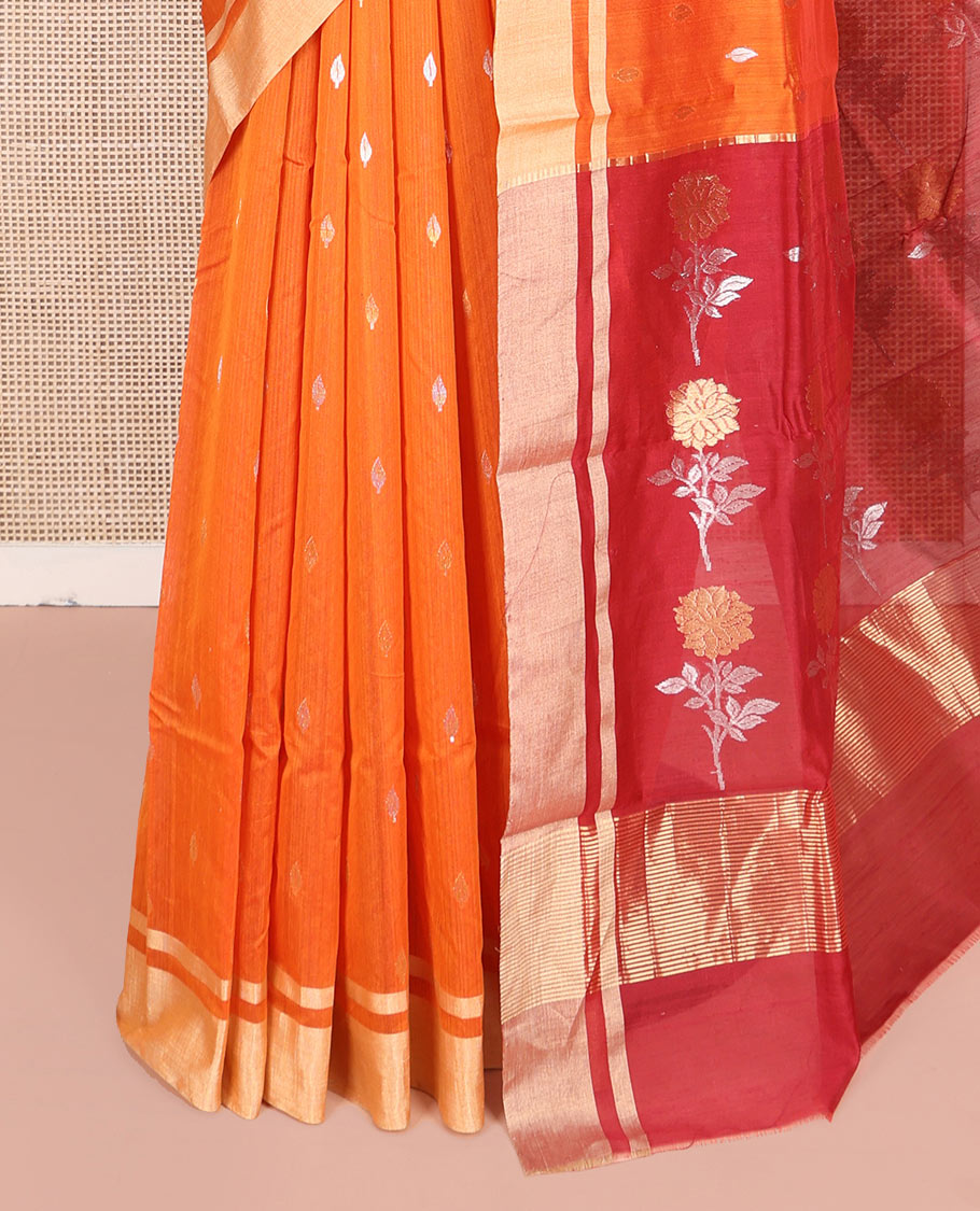 Orange Chanderi Cotton Saree, Decked Up with Buttas All Over Its Body, Highlighted by a Zari Border, Contrast Pallu Steeped with Floral Buttas, and Paired with a Contrast Blouse