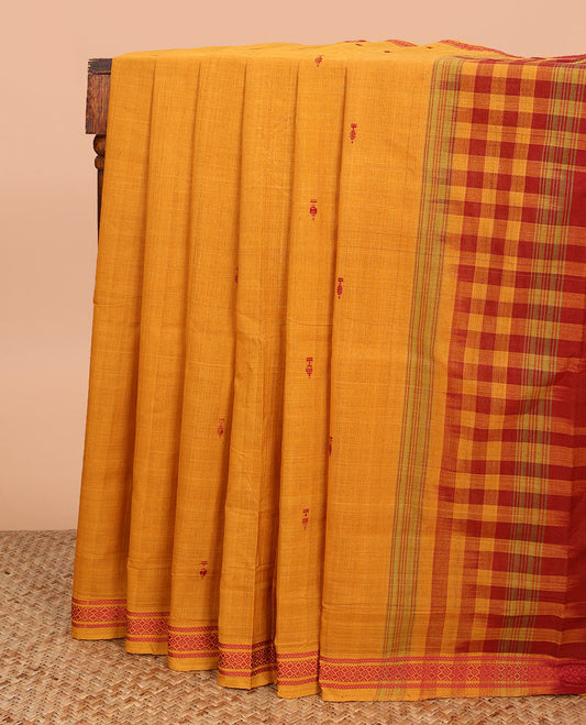 Orange thread buttas Andhra cotton saree, diamond-patterned border, and contrast-checked pallu of buttas