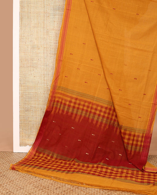 Orange thread buttas Andhra cotton saree, diamond-patterned border, and contrast-checked pallu of buttas